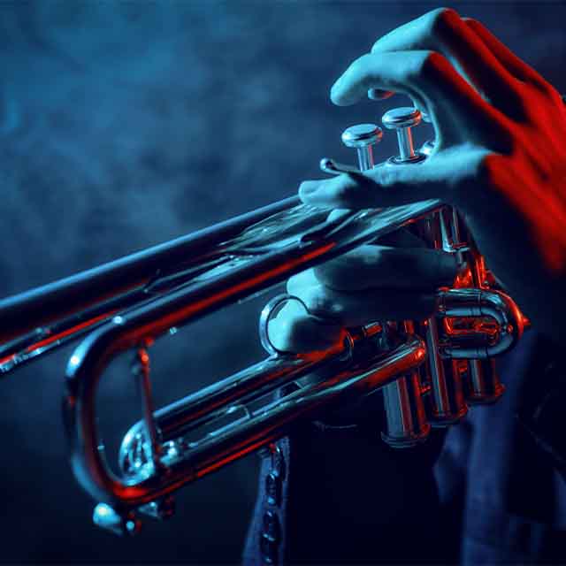 A person playing a trumpet