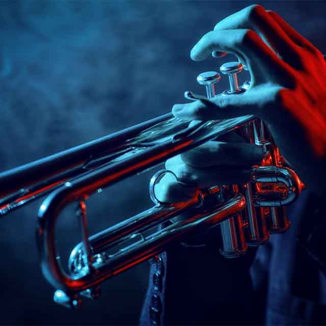 A person playing a trumpet